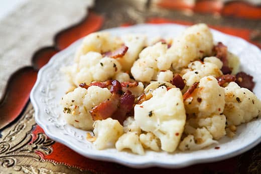 Coliflor con piñones y tocino